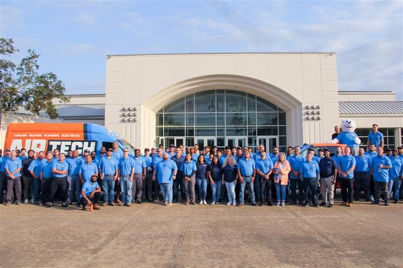 air tech of pasadena team photo in front of offices.