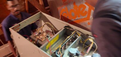 Techs carrying a new furnace